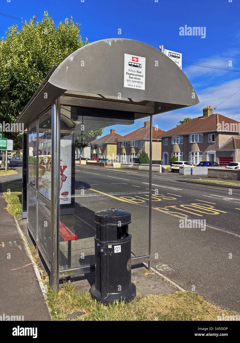 A bus stop near Weston Milton railway station in Weston-super-Mare, UK which is a designated departure point for rail replacement bus services - Smartphone Captured Stock Image