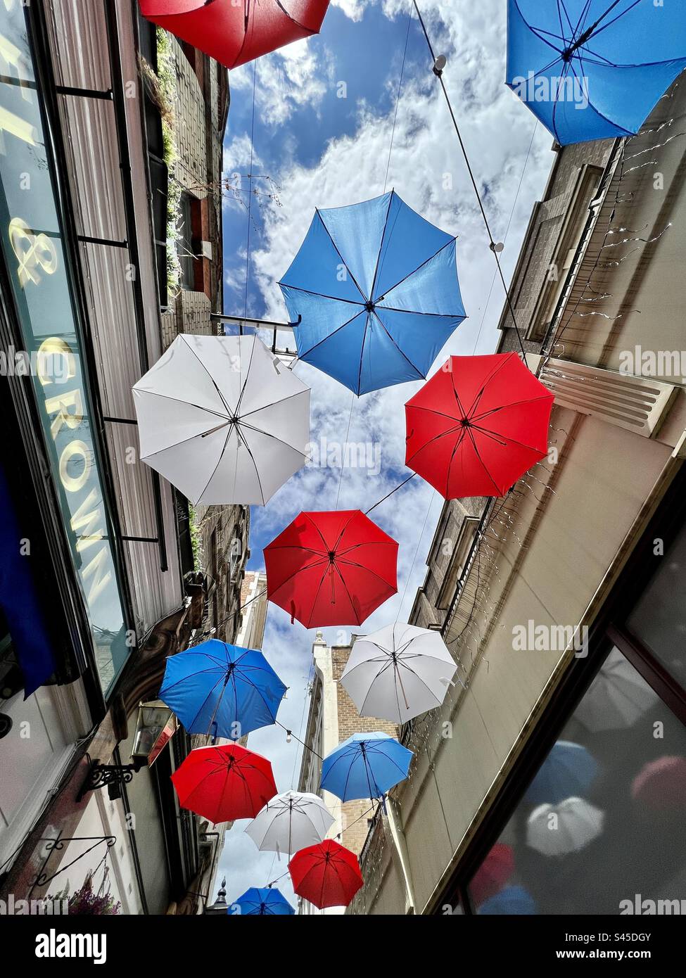 Umbrellas in London, suspended and colourful Stock Photo Alamy