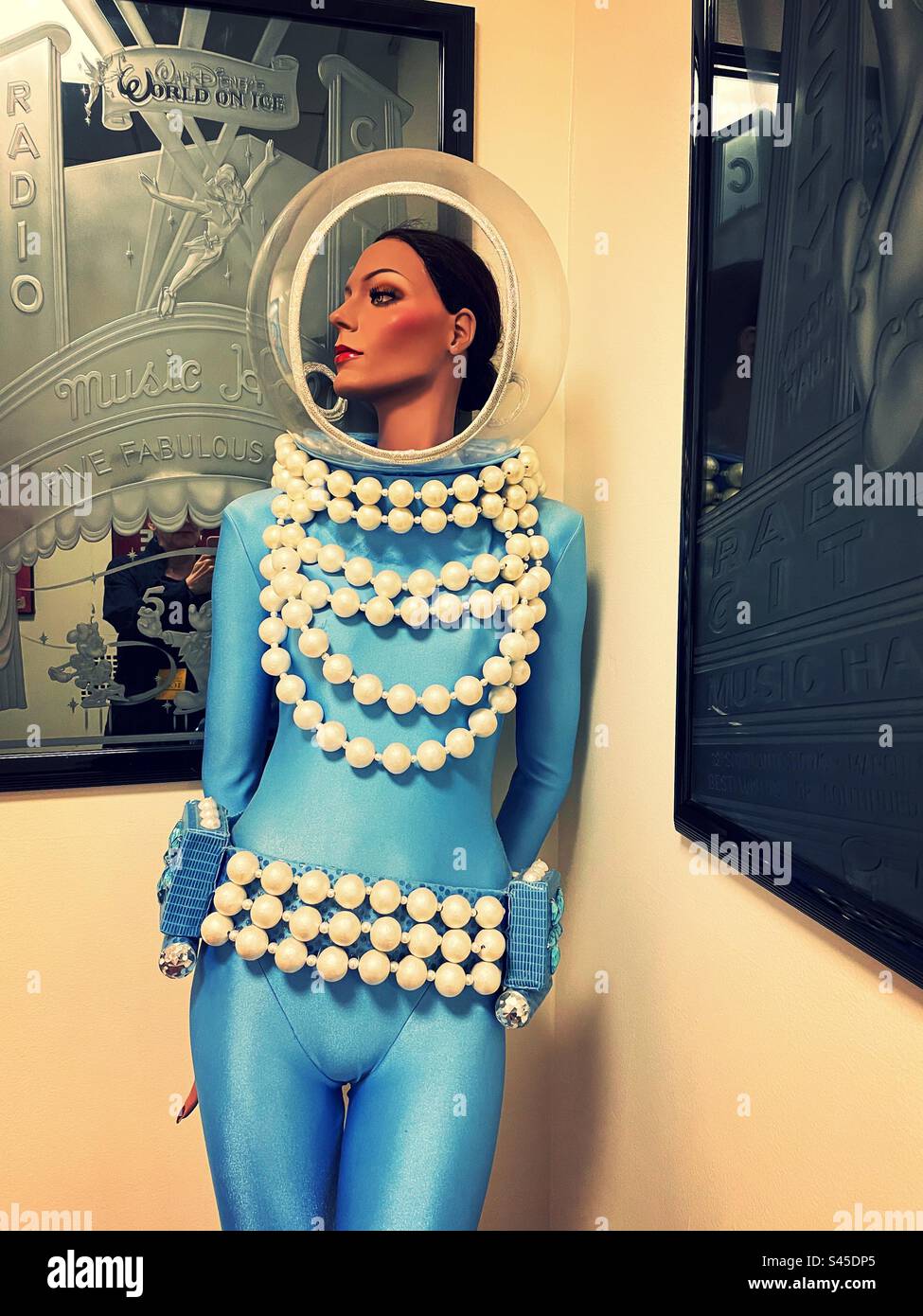 Female mannequin displaying a Rockette’s costume as part of the radio city music Hall tour, Rockefeller Center,, New York City, 2023, United States - Smartphone Captured Stock Image