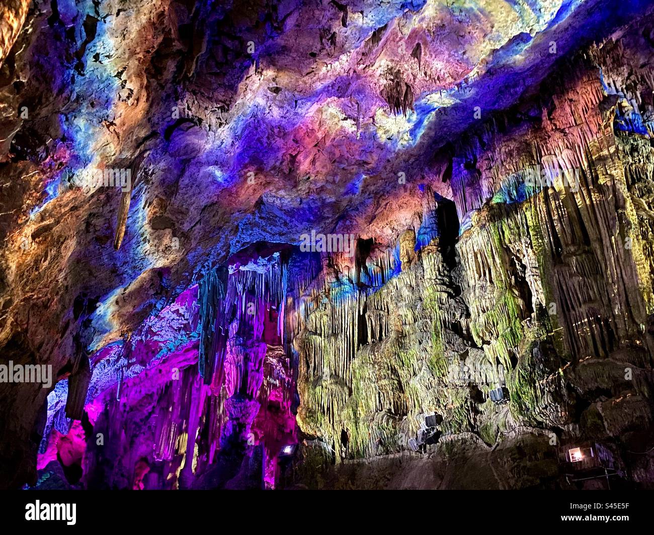 the-colourful-light-show-in-st-michael-s-cave-in-gibraltar-stock-photo