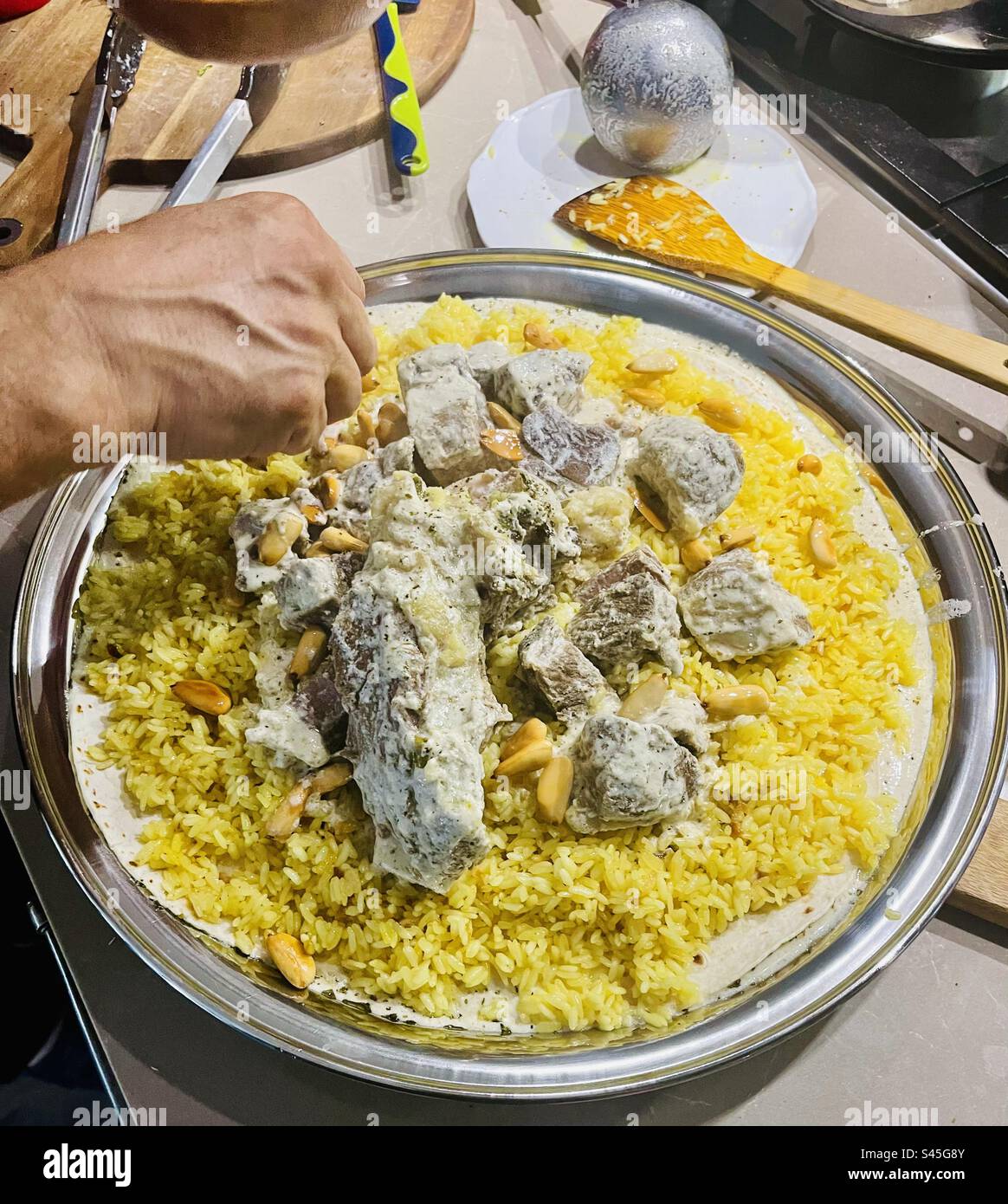 Mansaf is a traditional Levantine dish made out of lamb rice and yoghurt. - Smartphone Captured Stock Image Mansaf is a traditional Levantine dish made out of lamb rice and yoghurt. - Smartphone Captured Stock Image