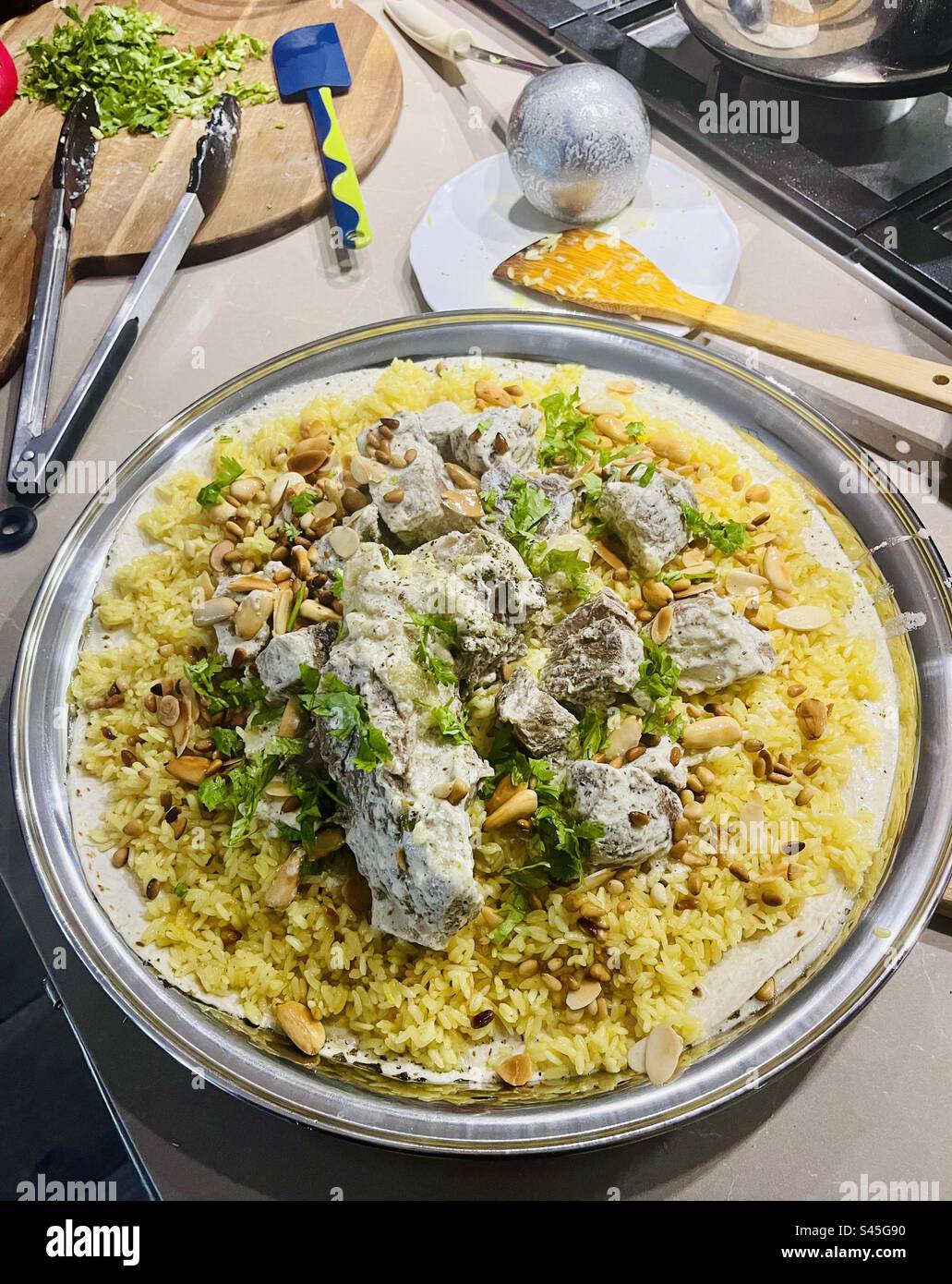 Mansaf is a traditional Levantine dish made out of lamb rice and yoghurt. - Smartphone Captured Stock Image Mansaf is a traditional Levantine dish made out of lamb rice and yoghurt. - Smartphone Captured Stock Image