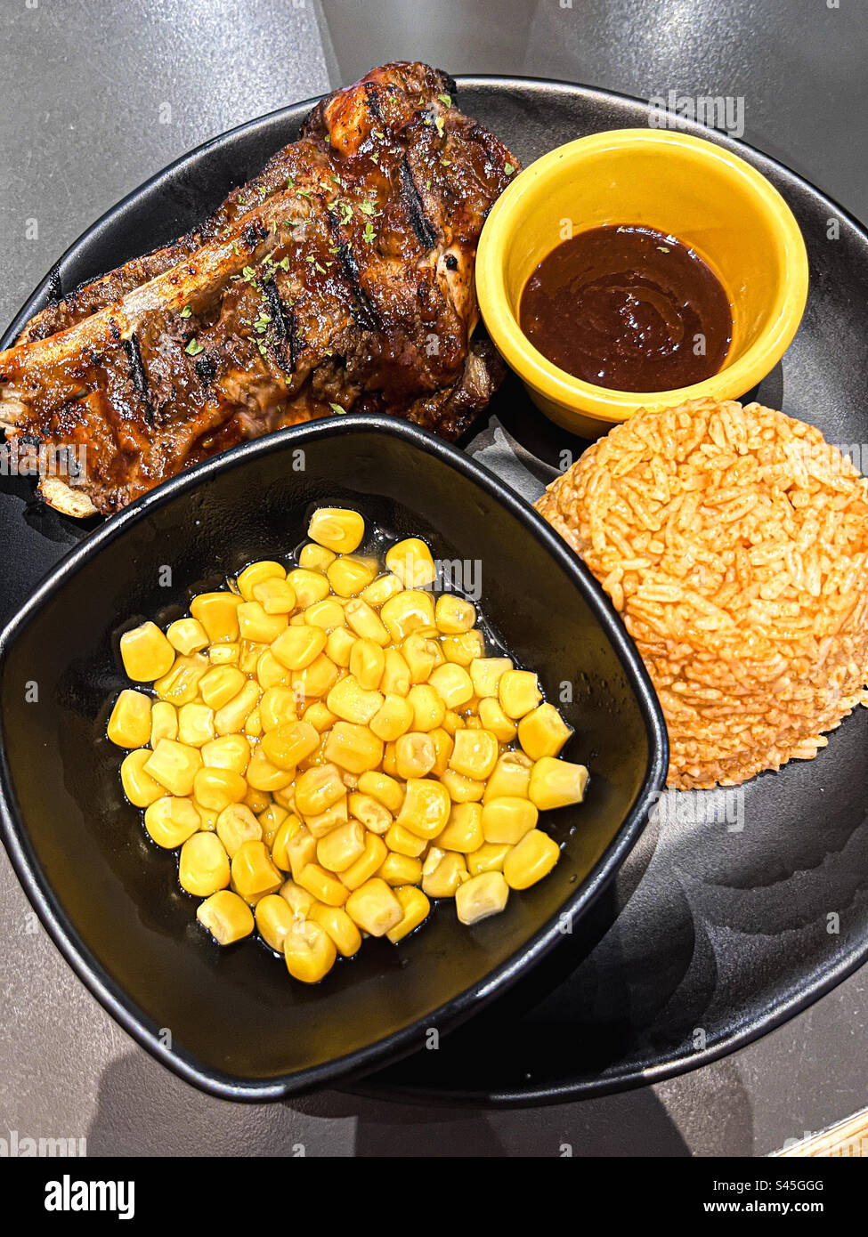 Quarter Ribs and Spanish Rice Stock Photo Alamy