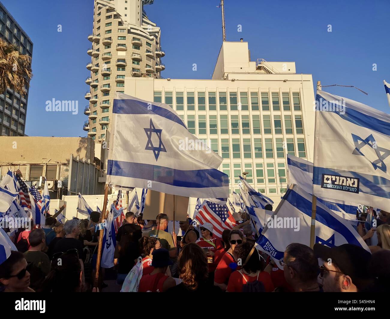 July 11th 2023, Tel-Aviv, Israel. Demonstration against the judiciary changes by the right wing Israeli government in front of the American consulate. - Smartphone Captured Stock Image