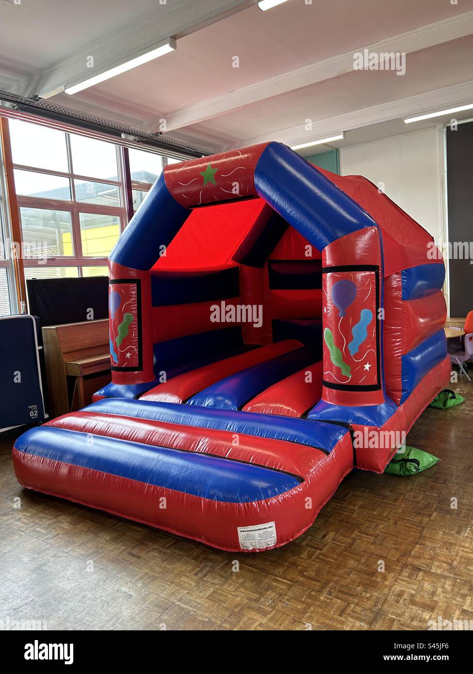 Bouncy castle jumping hires stock photography and images Alamy