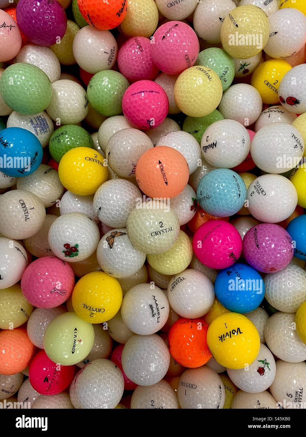 A collection of hundreds of colorful golf balls. - Smartphone Captured Stock Image