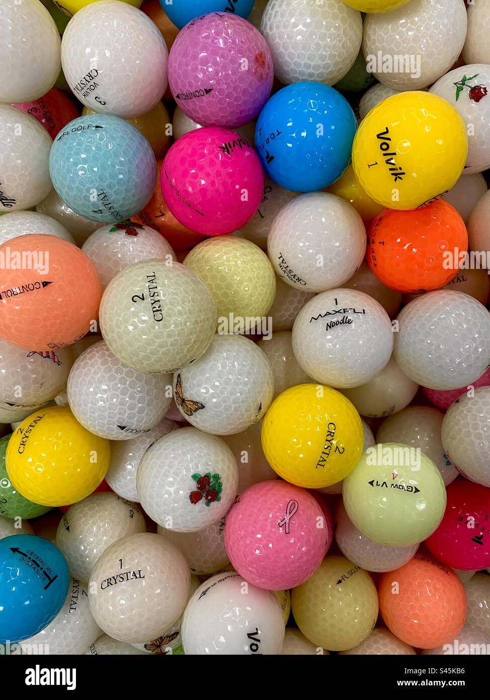 A collection of hundreds of colorful golf balls. - Smartphone Captured Stock Image