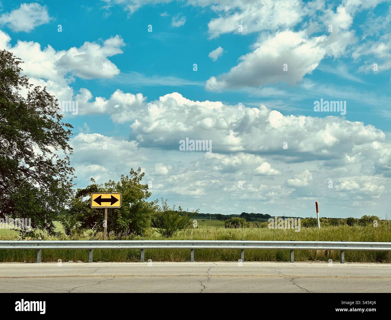 Road with arrow sign - Smartphone Captured Stock Image