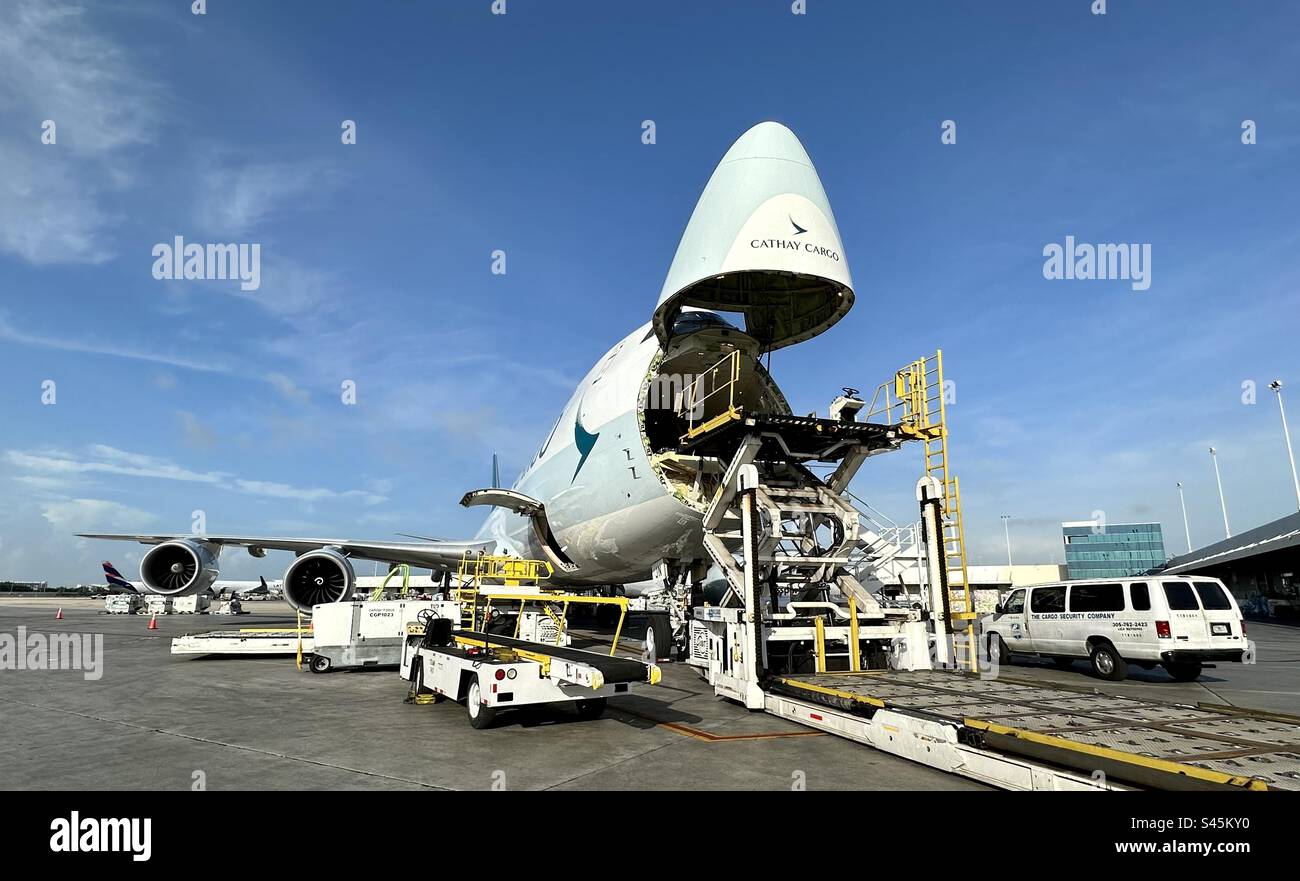 Cathay Cargo jet with nose door open. - Smartphone Captured Stock Image