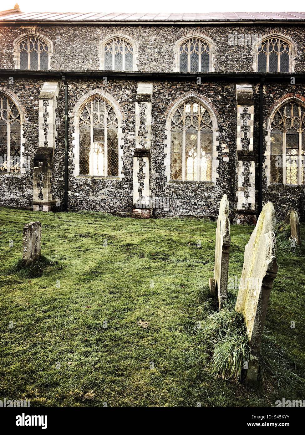 Church and graveyard at Ludham, Norfolk, England, United Kingdom Stock Photo
