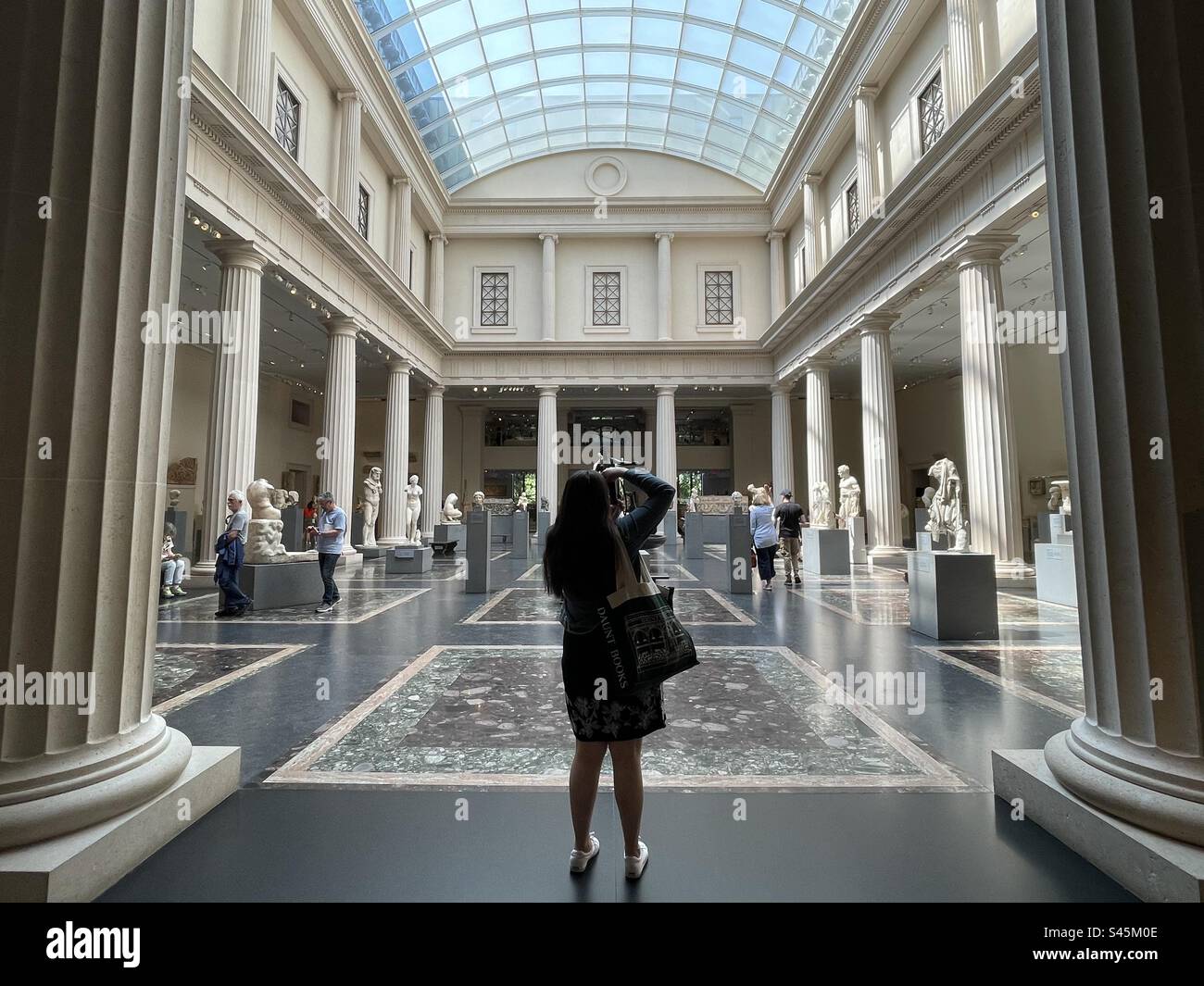 Photographer in museum - Smartphone Captured Stock Image
