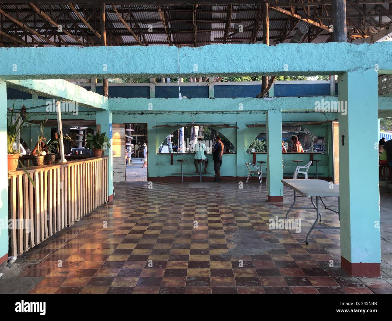 Taken in golden hour at local historical beach bar at Playa Brasilito