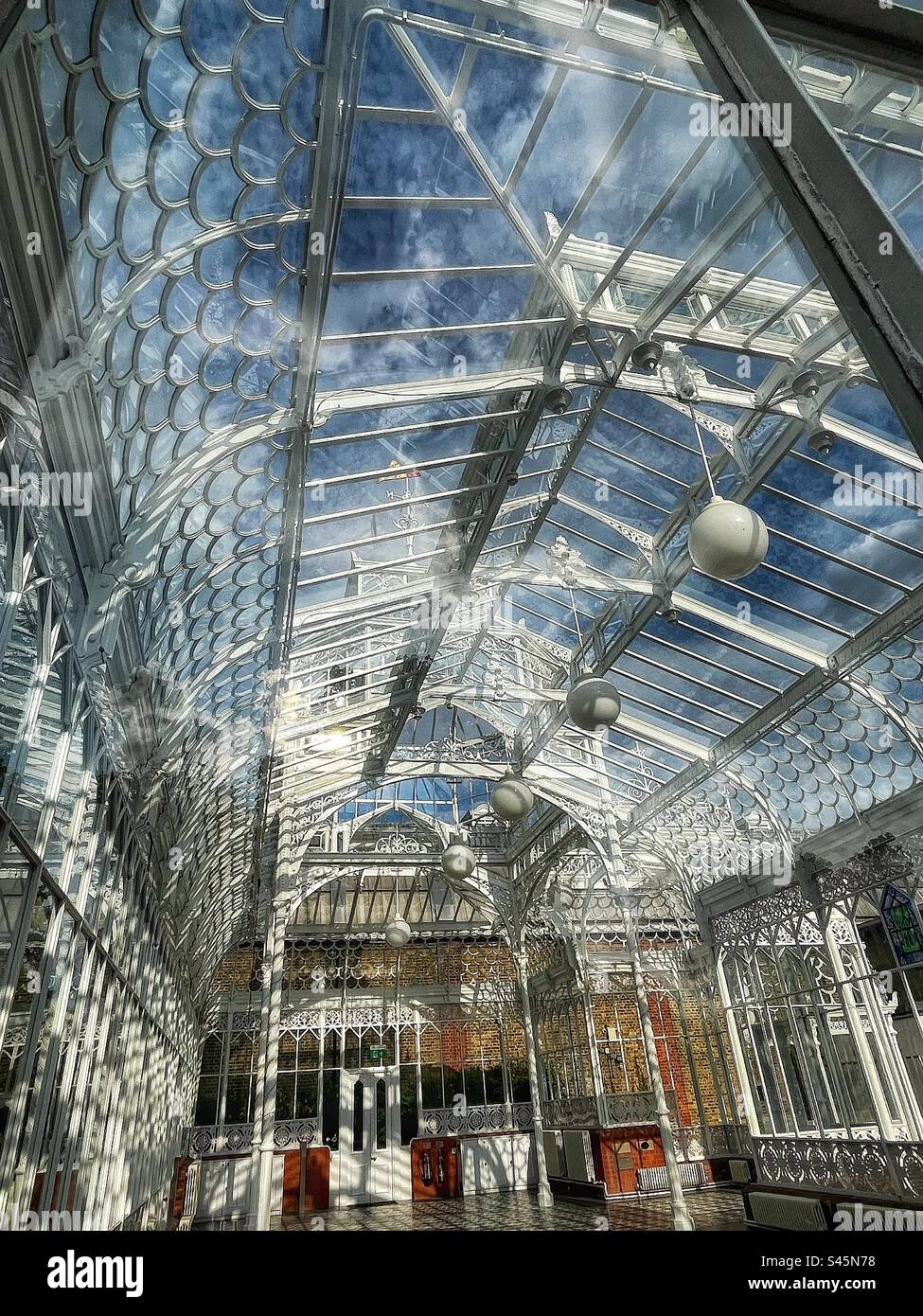 Inside of Horniman Museum’s conservatory constructed in 1894 by Glasgow firm, MacFarlane’s, Scotland at the time a world leader in architectural cast ironwork. - Smartphone Captured Stock Image