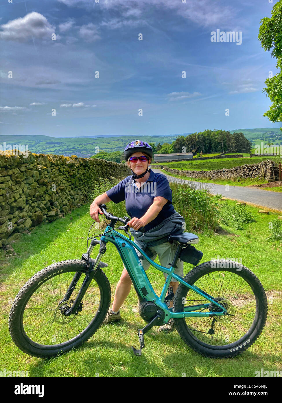 Woman posing with her MTB - Smartphone Captured Stock Image