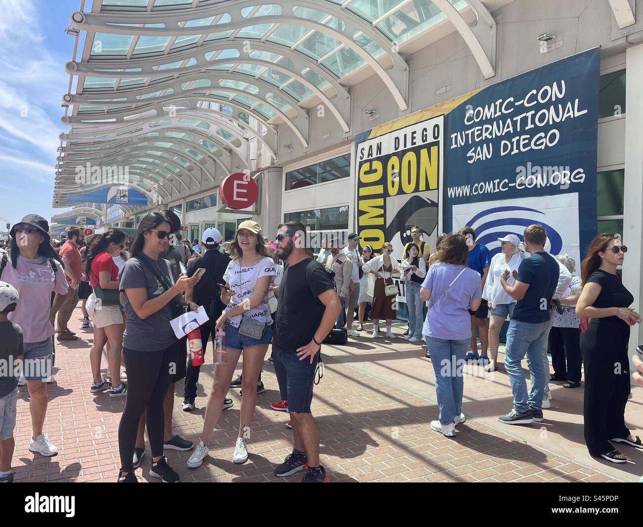 Comic Con attendees waiting on line to attend Comic Con 2023 day one held on July 20, 2023 - Smartphone Captured Stock Image