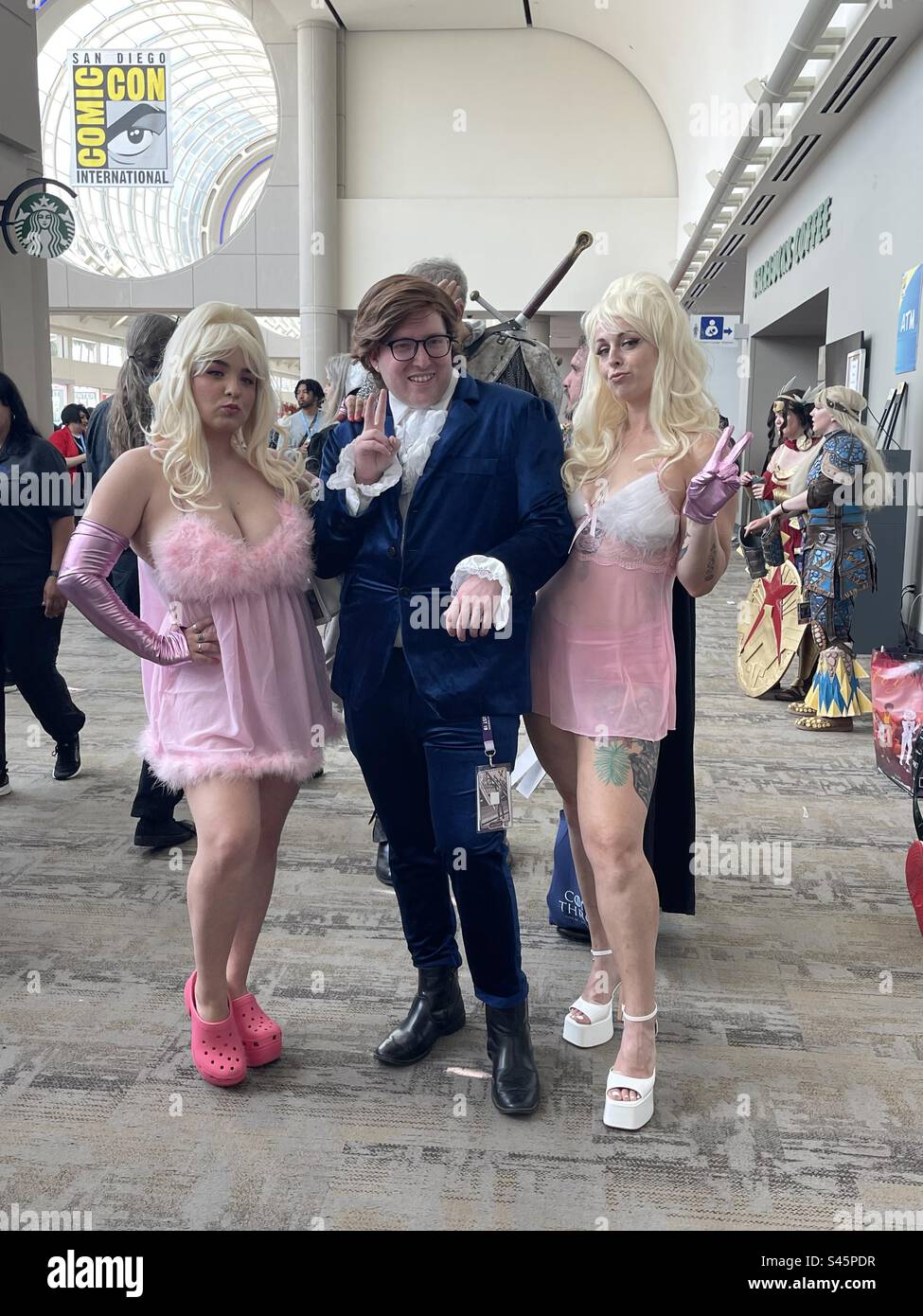 Cosplayers pose on Day 1 of San Diego Comic Con held on July 20, 2023 - Smartphone Captured Stock Image