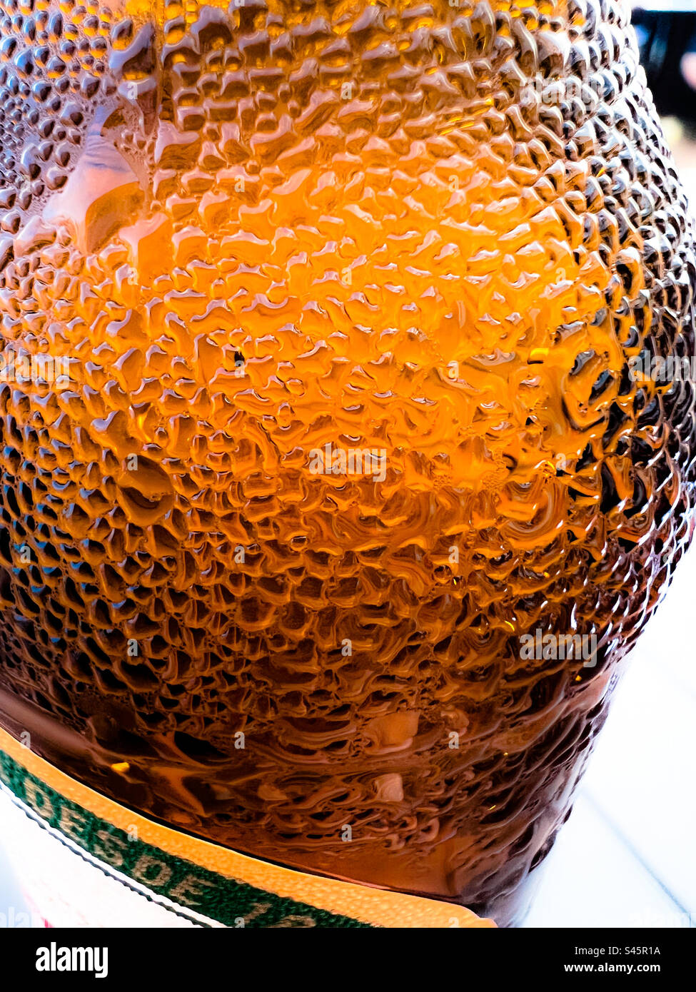 Close up of condensation on a refreshing ice cold bottle of beer Stock Photo