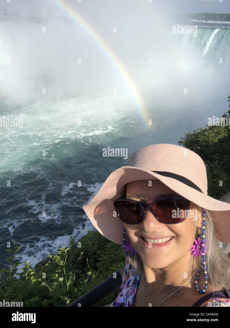 A woman visiting Niagara Falls, Canada. - Smartphone Captured Stock Image
