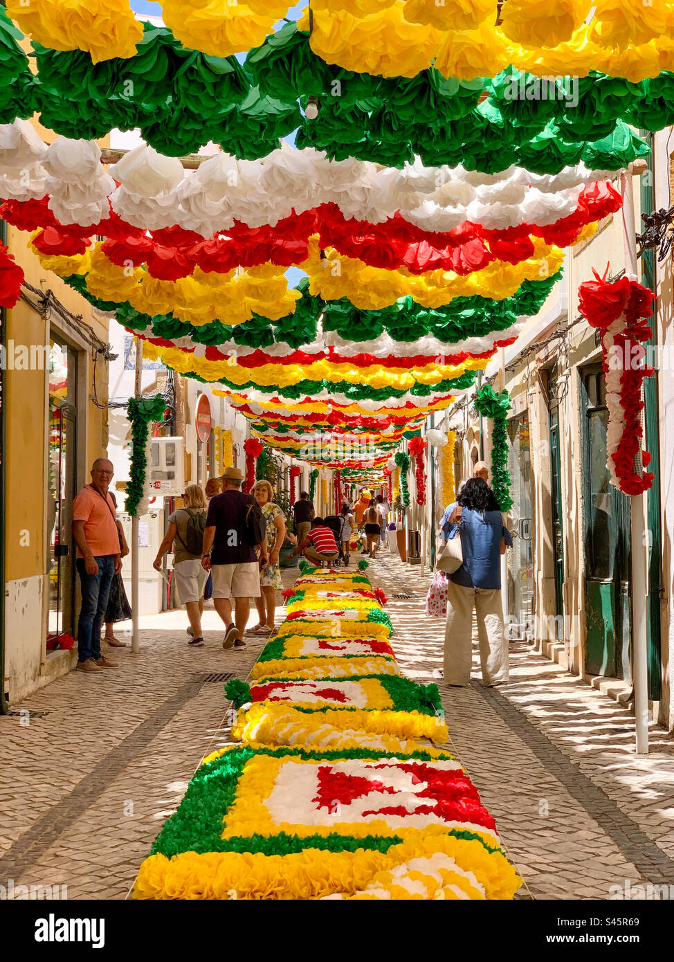 Streets Decorated With Paper Flowers And Displays For Festa Dos streets-decorated-with-paper-flowers-and-displays-for-festa-dos