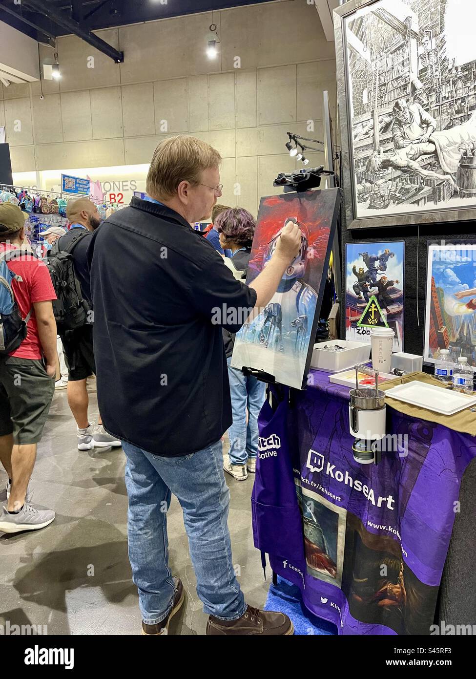 Artist paints a Star Wars character during Comic Con International day two held on July 21, 2023 in San Diego, California. - Smartphone Captured Stock Image