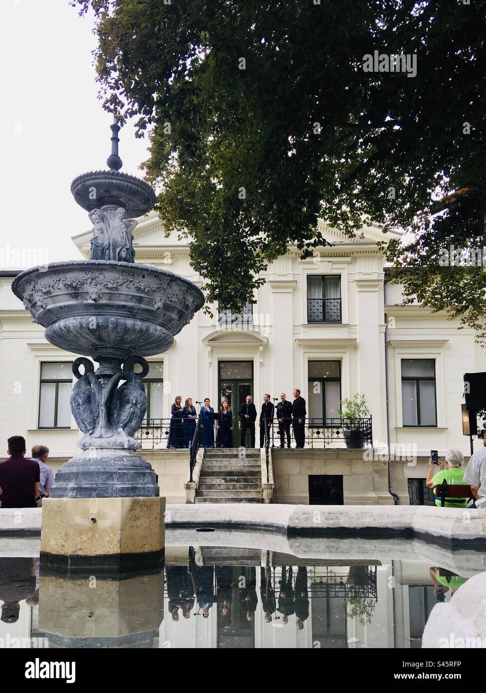 Octovoice chamber choir concert in park of Lenck villa, Sopron, Hungary - Smartphone Captured Stock Image