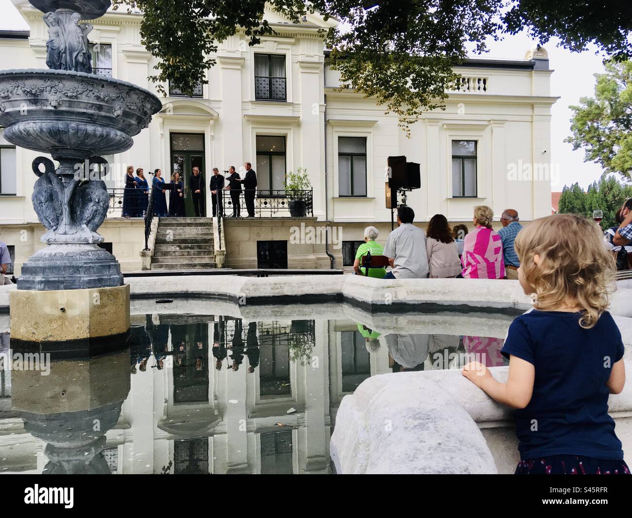 Octovoice chamber choir concert in park of Lenck villa, Sopron, Hungary - Smartphone Captured Stock Image