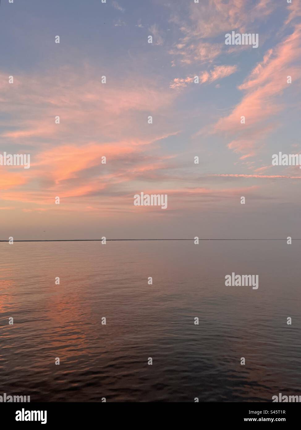 Soft pink sunset over the Choctawhatchee Bay Florida panhandle - Smartphone Captured Stock Image