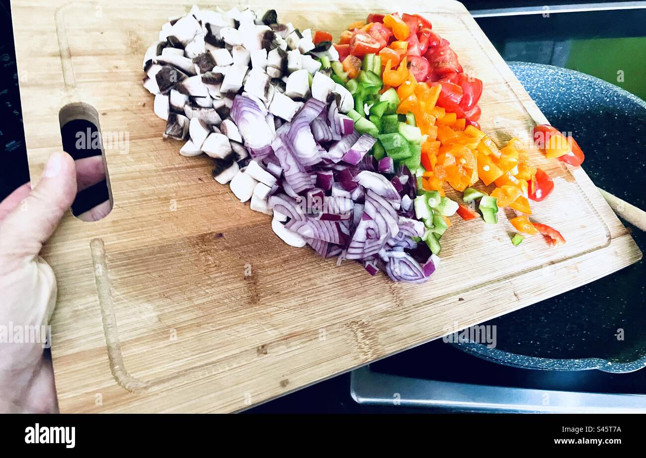 Heart shape of freshly chopped vegetables about to be cooked. Stock Photo