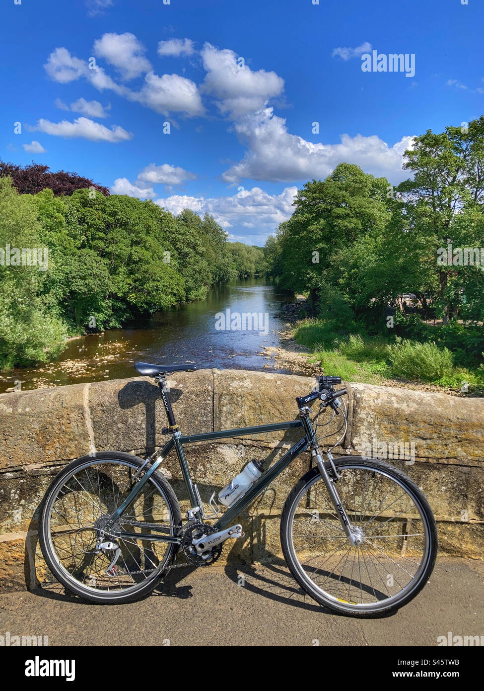 Pace RC200 F5 Mountain Bike on the old bridge over the river Wharfe in Ilkley West Yorkshire - Smartphone Captured Stock Image