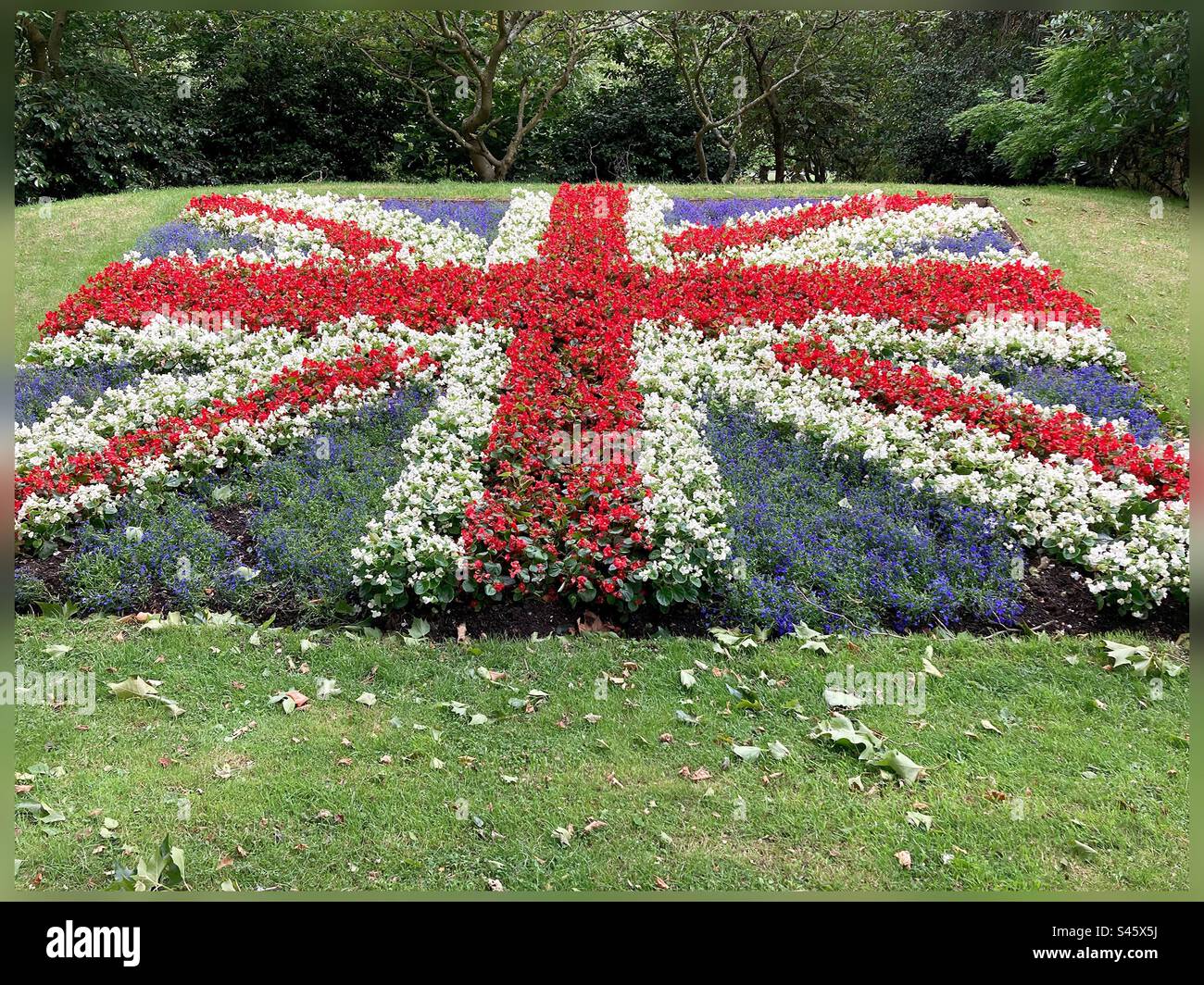 Union Jack flag design made with different flowers in public garden