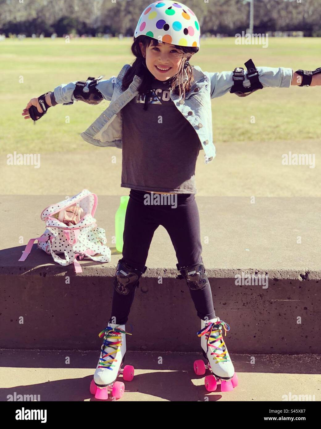 A young girl with rollerskates on Stock Photo