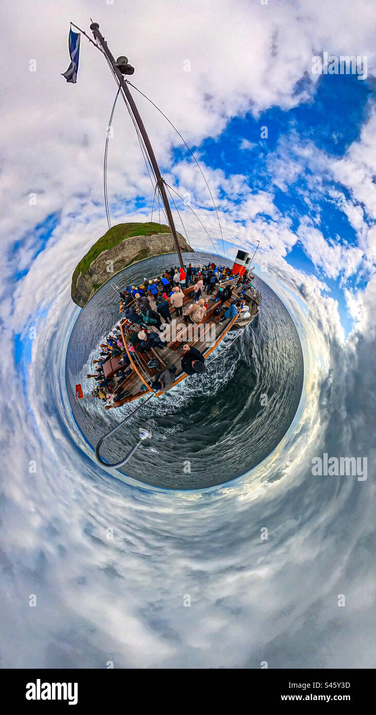 Paddle Steamer PS Waverley rounds the island of Ailsa Craig in the Firth of Clyde, Scotland. - Smartphone Captured Stock Image