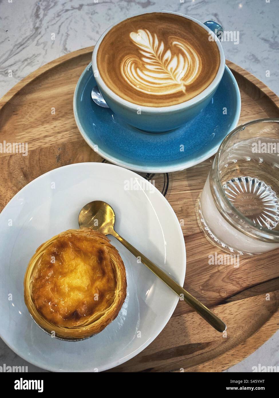 Coffee and egg tart Stock Photo