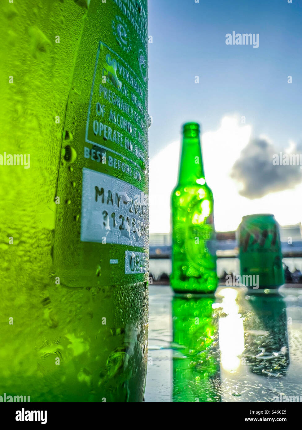 Heineken beer on table during summer - Smartphone Captured Stock Image