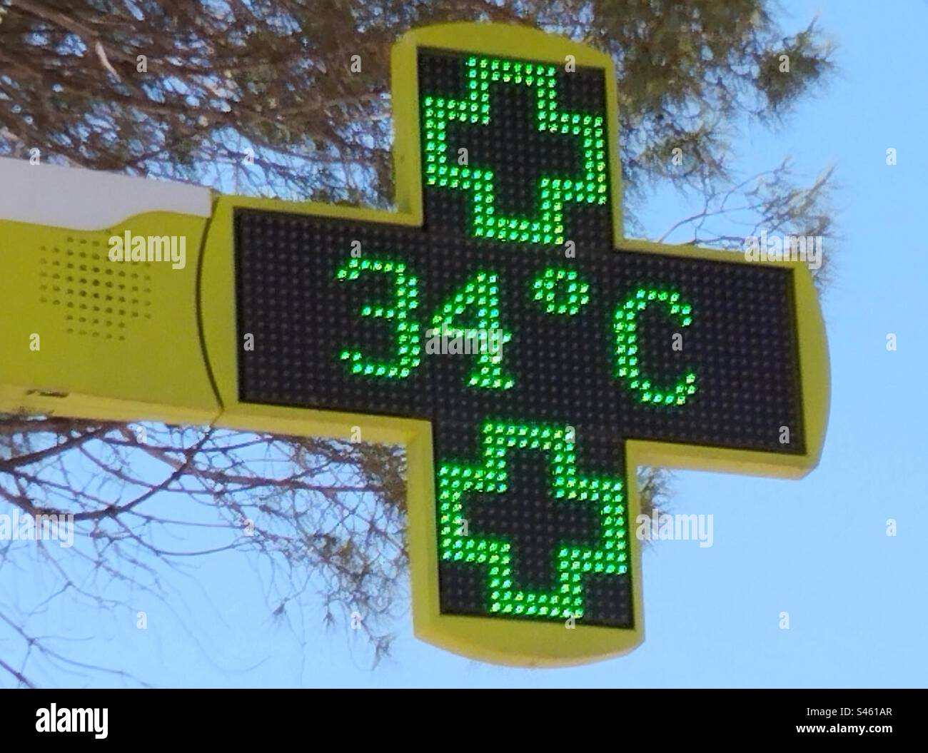 High temperature, heat wave. Display on the sign of a pharmacy.  Colombiers, Occitanie, France - Smartphone Captured Stock Image
