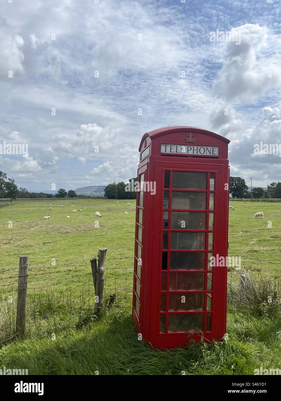 Telephone box in the countryside Stock Photo