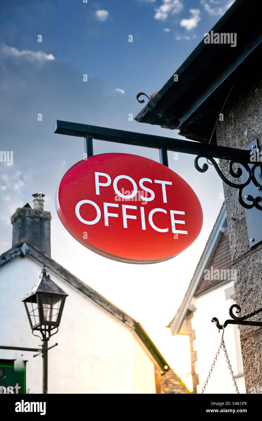 Post Office sign in a vintage village environment - Smartphone Captured Stock Image