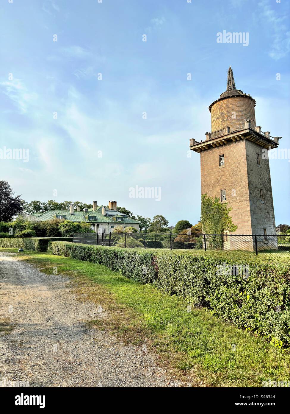 Harkness Memorial State Park in Waterford, Connecticut, USA. Former windmill and carriage house in the distance. Summer day in New England. - Smartphone Captured Stock Image