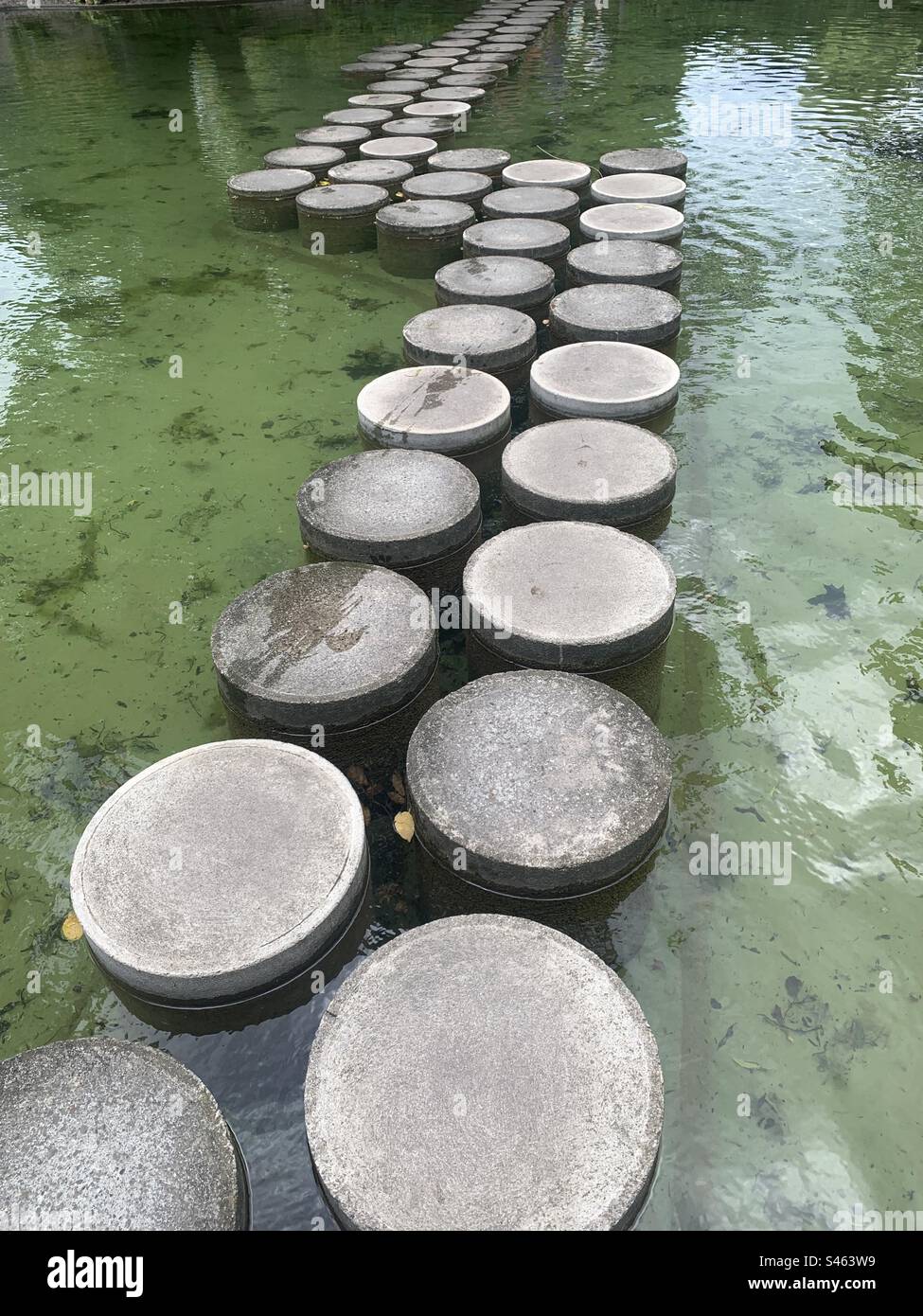 Stepping stones across pond in Zurich - Smartphone Captured Stock Image