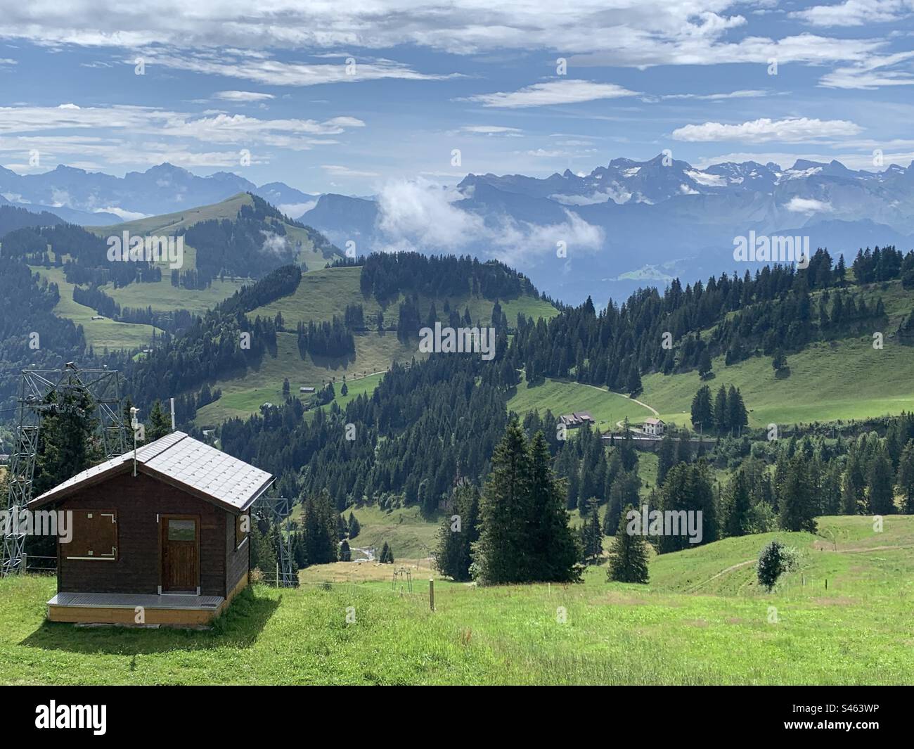 Small wooden house in the Swiss alps - Smartphone Captured Stock Image