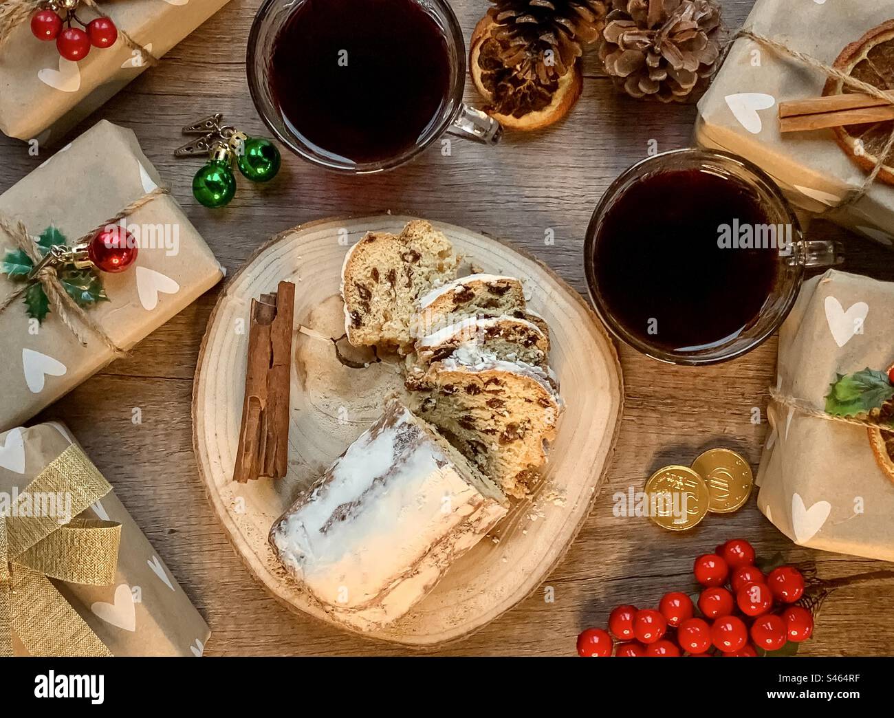 Festive flat lay with stollen, mulled wine and gifts - Smartphone Captured Stock Image