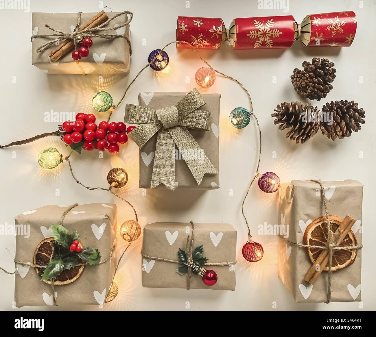 Festive flat lay with gifts and lights - Smartphone Captured Stock Image