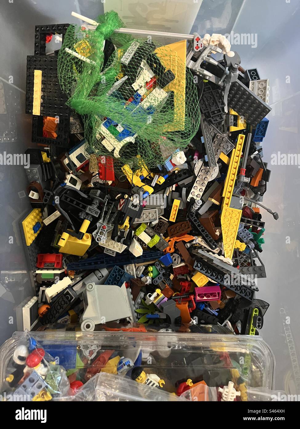 Plastic tube filled with LEGO - Smartphone Captured Stock Image