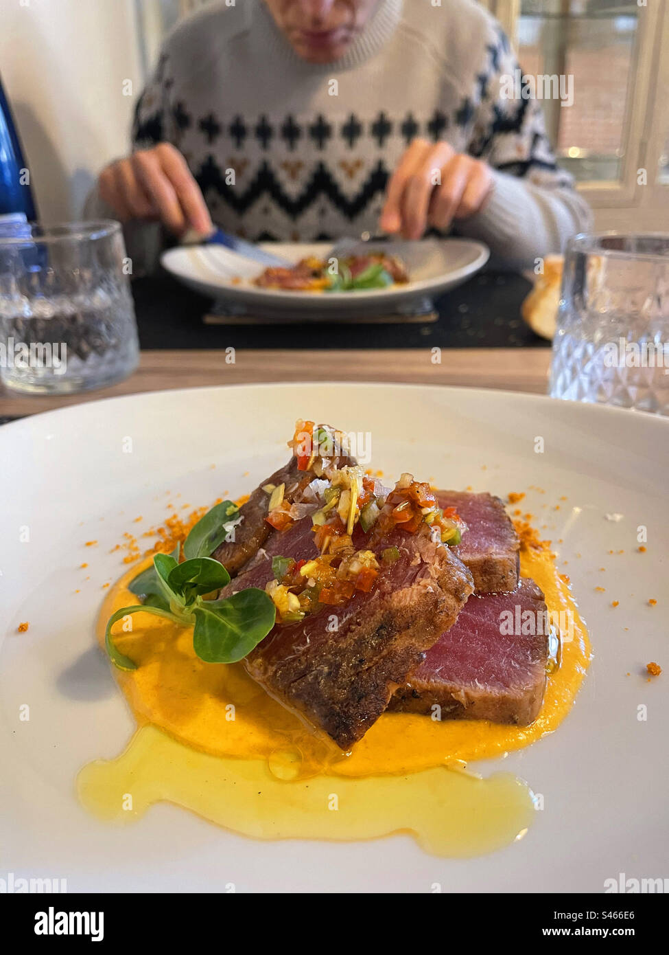 Red tuna loin with sauce. Spain. Stock Photo