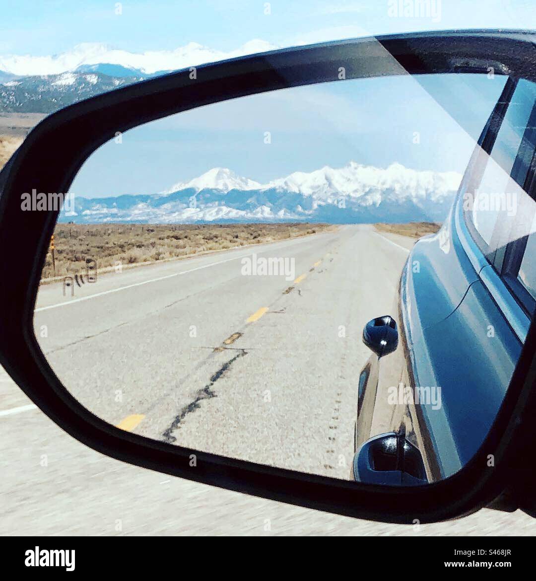 Mountain reflection in rear view mirror - Smartphone Captured Stock Image