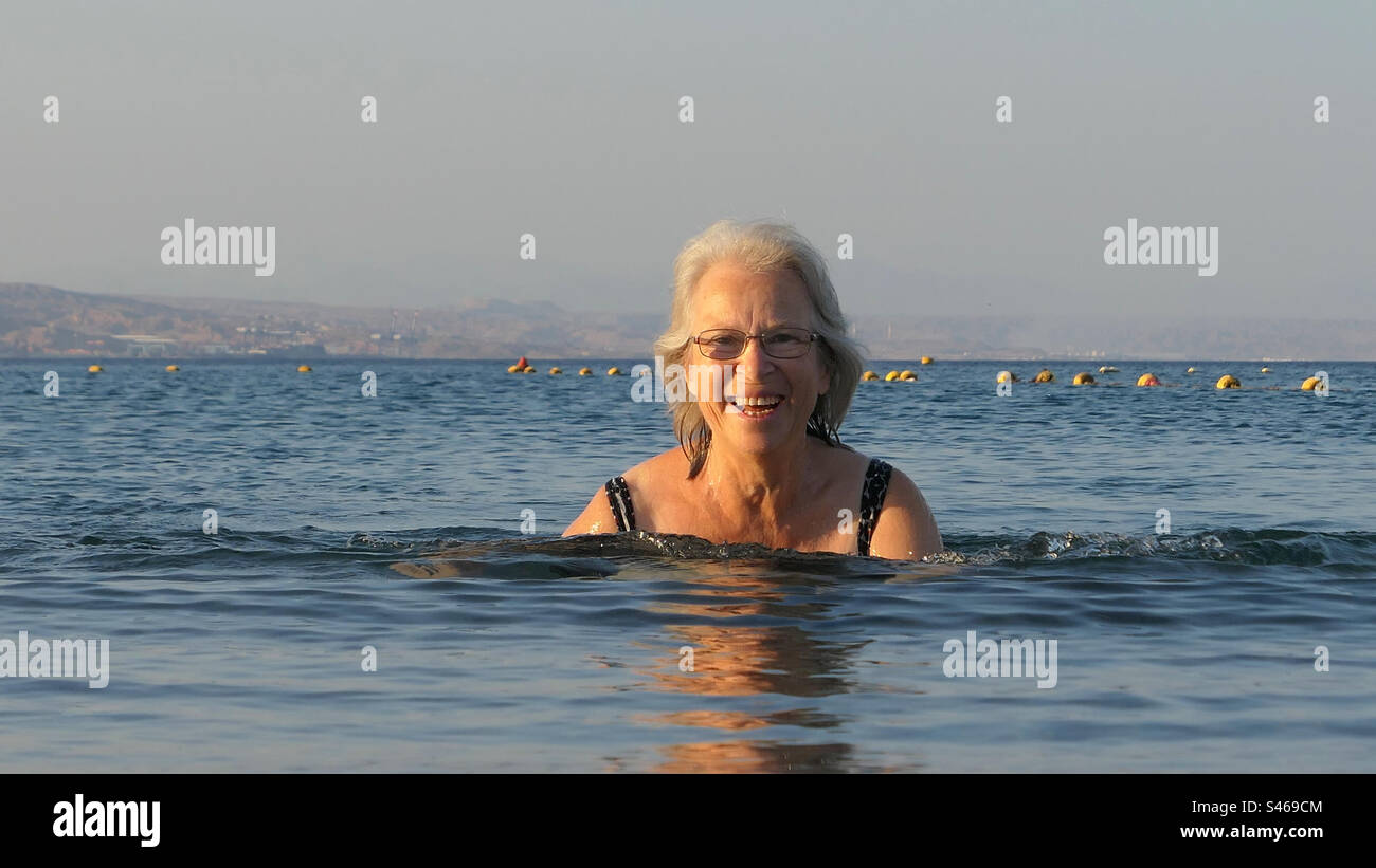 Senior woman swimming hi-res stock photography and images - Alamy