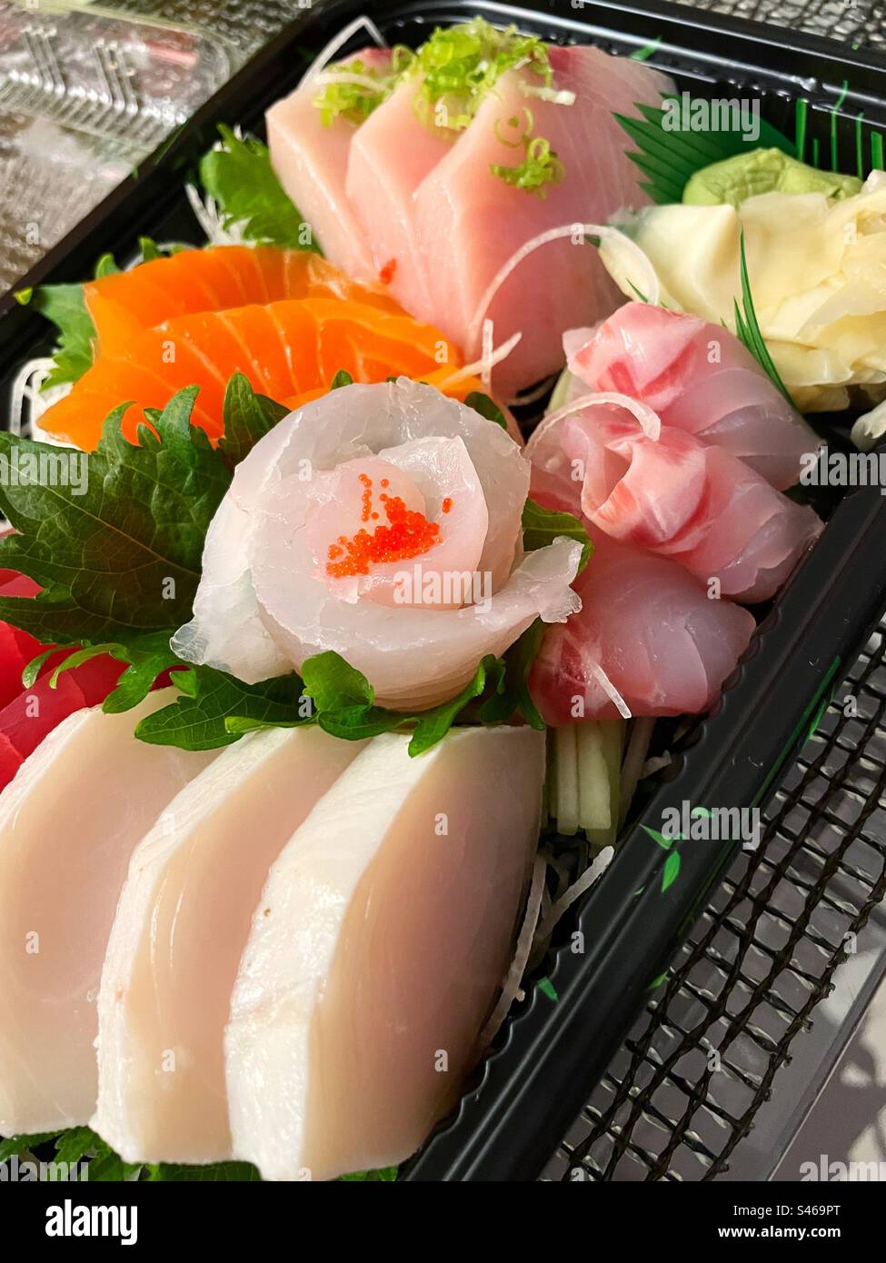 Close up of a delivery sashimi meal from a Japanese restaurant, 2023, New York City, United States - Smartphone Captured Stock Image
