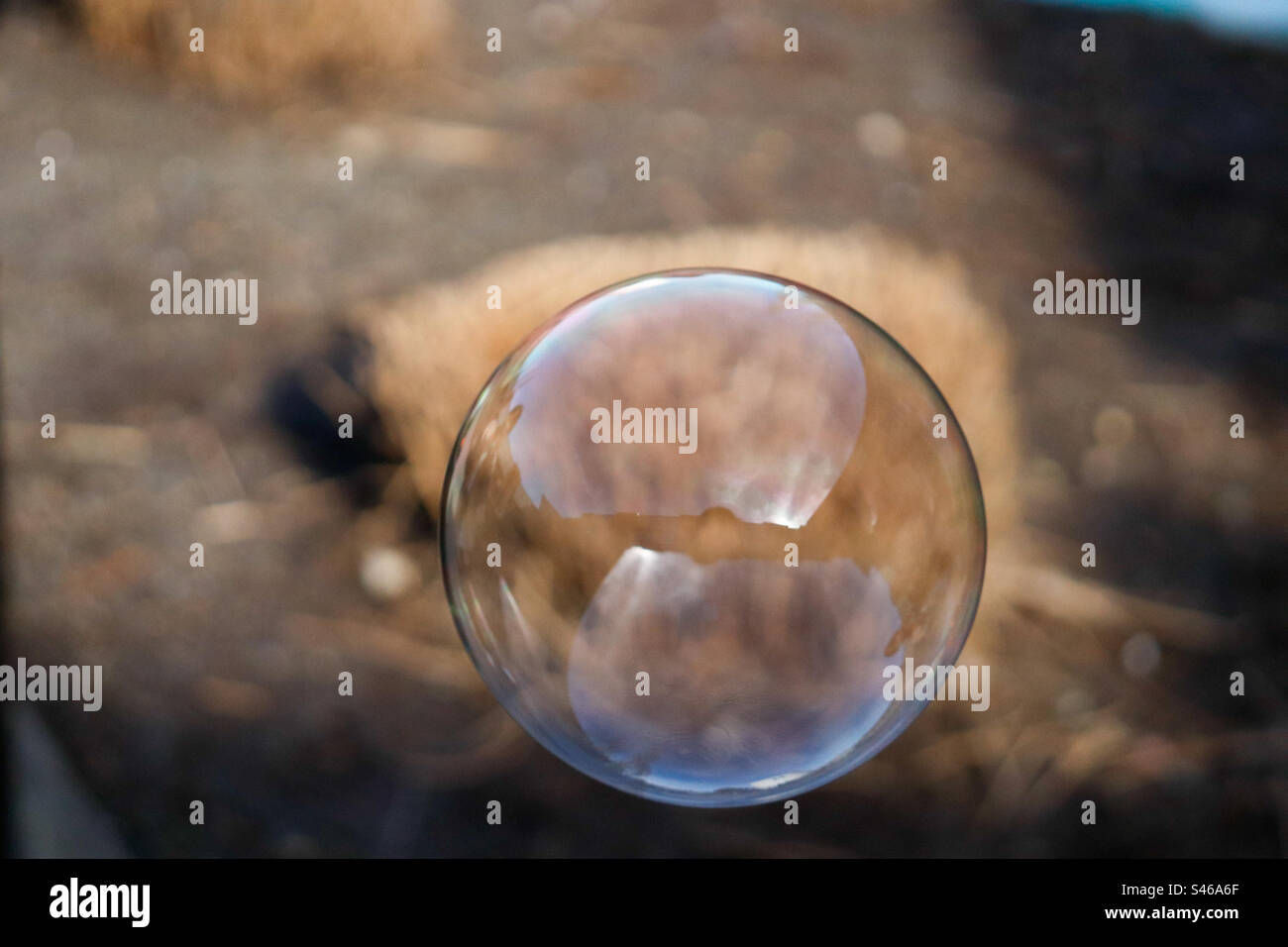 Bubble floating in mid air Stock Photo - Alamy