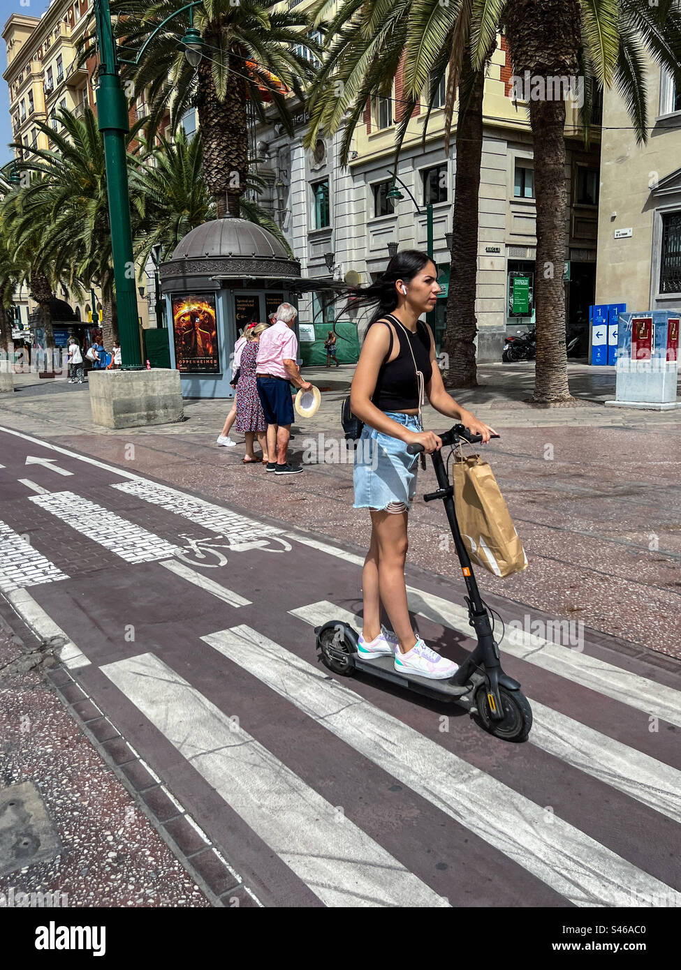 Riding electric scooter hi-res stock photography and images - Alamy