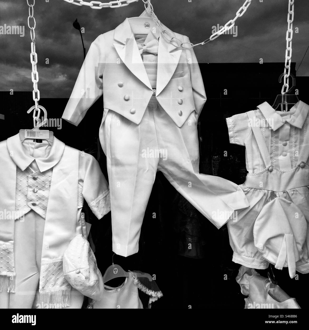 Children s Clothes Hanging In A Store Window Stock Photo Alamy Children s Clothes Hanging In A Store Window Stock Photo Alamy